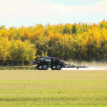A farmer takes advantage of a wind-free late September morning to spray a field east of Kleskun Hills Park near Bezanson, Alta. Warm conditions mean fall weed control is effective and a lot cheaper than it will be in the spring, as glyphosate prices are predicted to rise through the winter. | Randy Vanderveen photo