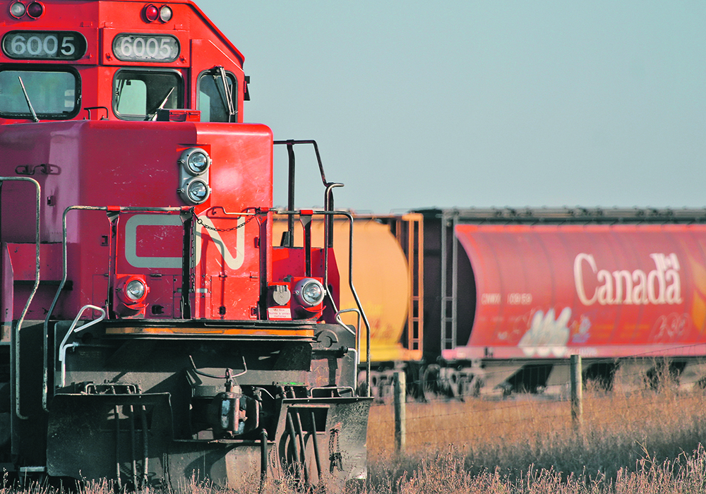 Canadian National Railway is reducing costs to stave off an investor revolt while Canadian Pacific Railway faces significant debt after buying Kansas City Southern. It is a potentially dangerous situation for shippers such as grain growers. | File photo