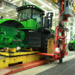 Earlier this month, the world's largest farm equipment maker and the UAW union reached an agreement after weeks of negotiation on wages and other benefits, but 90 percent of the union's workers voted against the deal. | Screencap via deere.com