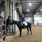 Ilse Dedden on Vienna and Gayle Smith on Black Dialya enter and exit the ring for the dressage test during the recent Off-Track Thoroughbred Challenge in Saskatoon. | Elizabeth Ireland photo