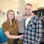 Destiny Williams and Shane Hilderman, with daughter Jasmine, in the kitchen of Hillside Food on their farm near Duval, Sask. Sons Cooper and Benson were at school. | KAREN BRIERE PHOTOS