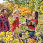 Jon Jenkins, left, Myra Jenkins and Teri Jenkins sit in their pumpkin patch. Teri and Jon run Brown Sugar Produce after they bought out Teri’s mom in 2021. | Sandy Black photo