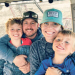 The Kelly family, left to right, Copeland, Matt, Lesley and Jennings operate a 7,000-acre family farm south of Saskatoon. | Photo by Lesley Kelly