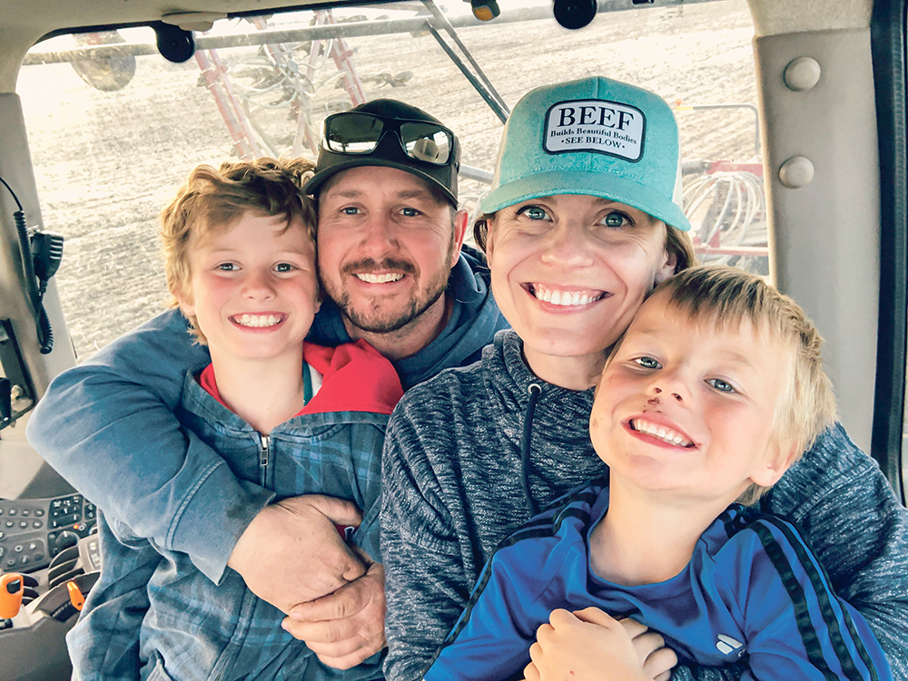 The Kelly family, left to right, Copeland, Matt, Lesley and Jennings operate a 7,000-acre family farm south of Saskatoon. | Photo by Lesley Kelly