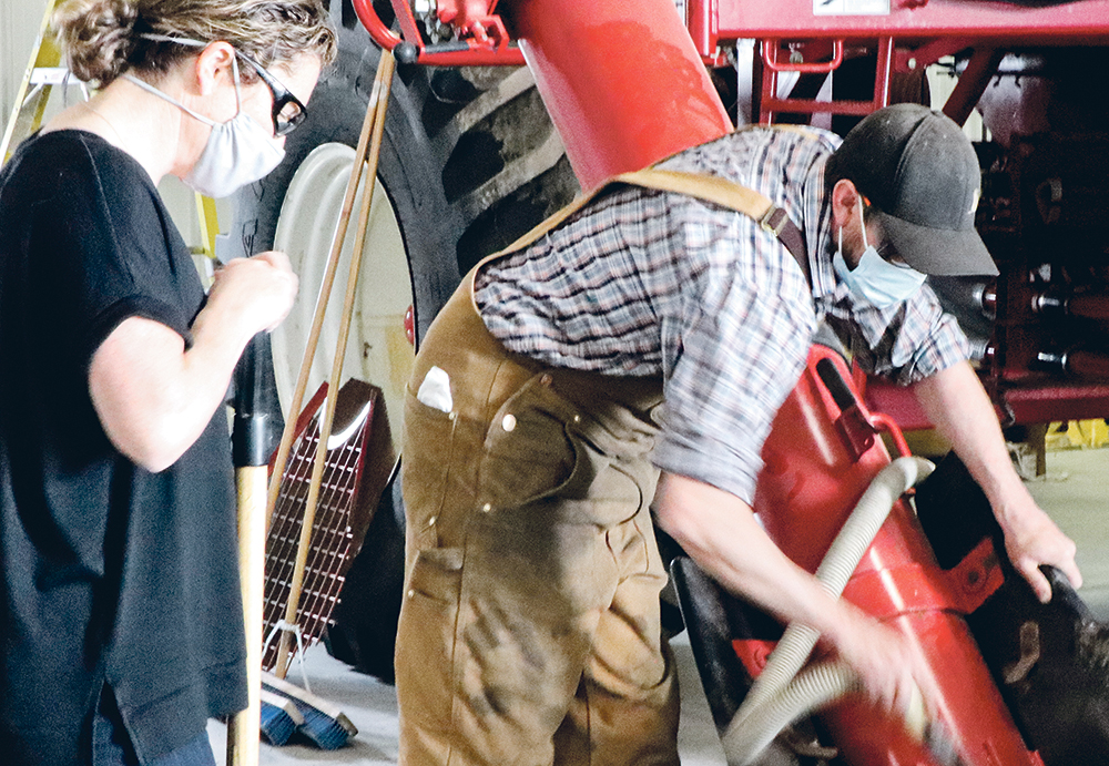 PAMI chief executive officer Leah Olson works in the shop with fabricator Tyler Dies. “When it comes to electronics, I’ve seen some leaps and bounds by farmers young and old working on electronic equipment,” Olson says. “At the other end, I know farmers who still don’t have autosteer. They just don’t trust it. They’re nervous about it.” | PAMI PHOTO