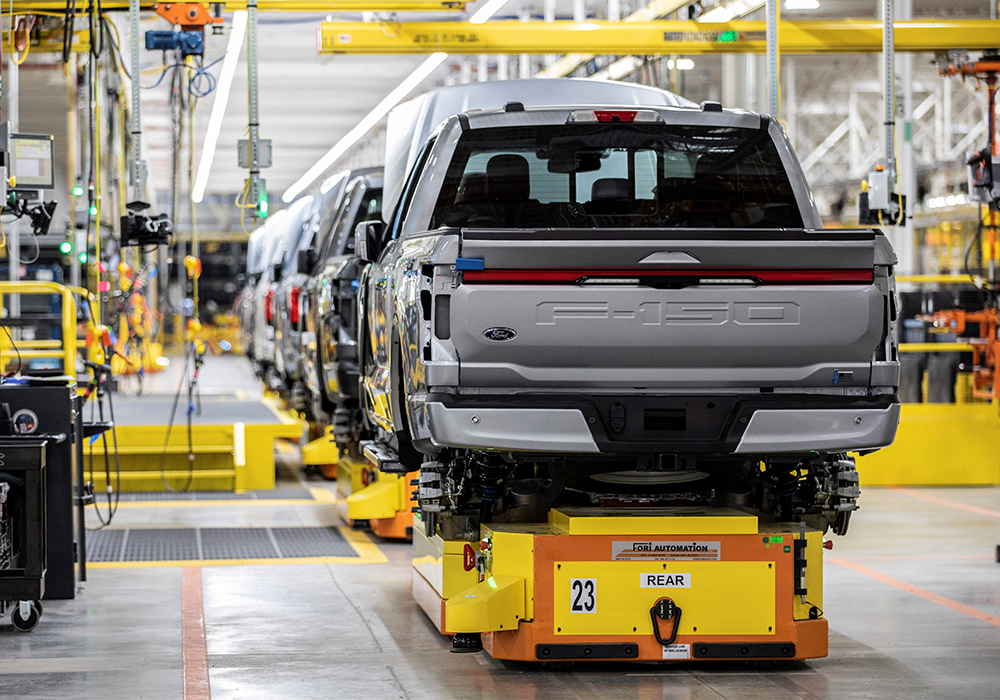 Ford's stock jumped more than 11 percent to its highest level since 2001 after the Detroit automaker said it will nearly double production capacity for its red-hot F-150 Lightning electric pickup to 150,000 vehicles. | Twitter/@BobHolycross photo