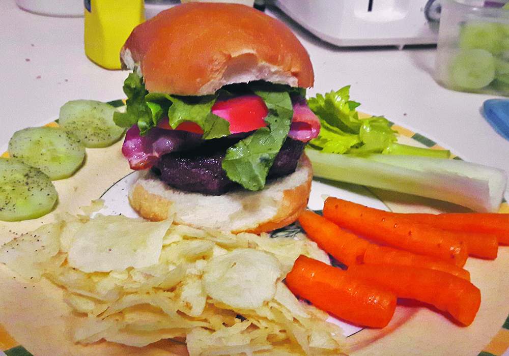 The flavour of an arena burger beats commercially prepared meat patties. | Sheri Hathaway photo
