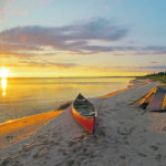 Tenting allows people to stay in places not otherwise accessible, such as idyllic lakeside sites on a canoe trip. | Robin & Arlene Karpan photo