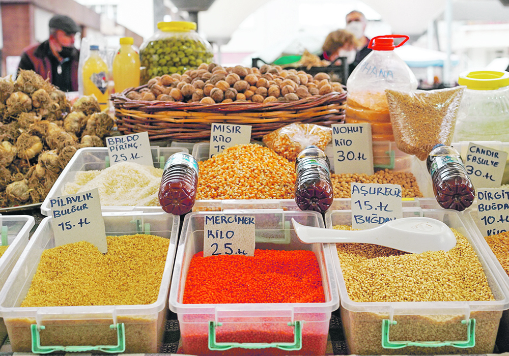 Lentils are sold in a daily open air market in Antalya, Turkey. Many of the farmers in the market and their customers were concerned about the affordability of food and other staples. | Louise Erskine photo
