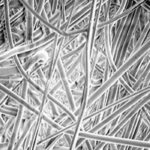 The straight, round synthetic MicroLoc fibers allow oil to flow faster and filter finer particles. This lowers restriction and reduces engine wear. | New Holland photo