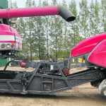 Ian Thorson’s new combine/baler/combo gets its power from the savings in chopping and spreading. Between 180 and 200 h.p. were saved, while the baler and transfer unit use about 150 h.p. from the back of the machine. | TW Enterprises photo