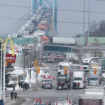 Horn-blaring protests have being causing gridlock in the capital Ottawa since late January and from Monday night, truckers shut inbound Canada traffic at the Ambassador Bridge, a supply route for Detroit's carmakers and agricultural products. | Twitter/@winstarjanisse photo