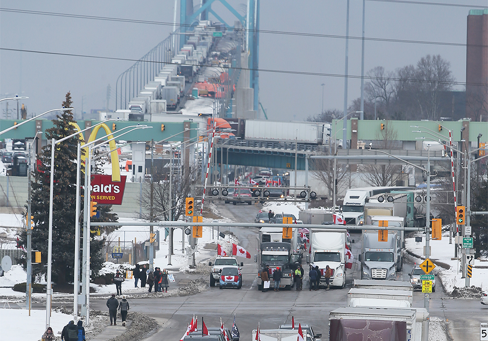 Horn-blaring protests have being causing gridlock in the capital Ottawa since late January and from Monday night, truckers shut inbound Canada traffic at the Ambassador Bridge, a supply route for Detroit's carmakers and agricultural products. | Twitter/@winstarjanisse photo