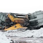 The twisted wreckage of a Canadian Pacific Railway freight train carrying corn lies near Drinkwater, Sask., after it derailed about 6:30 a.m. March 13. | Karen Briere photo