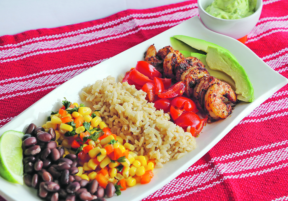 Longing for a Mexican holiday? This salad with flavourful blackened shrimp, avocado cilantro dressing and corn salsa will make your taste buds feel like you are under the Mexican sun. | Betty Ann Deobald photo