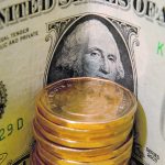 The Canadian dollar usually strengthens when oil prices reach the levels they are at now. However, this time global security worries are prompting investors to sell riskier holdings and opt for what they perceive to be safer investments, such as U.S. Treasury Bonds. This in turn causes the American greenback to appreciate against other currencies, including the loonie. | Getty Images