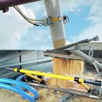 For growers who want to automate the process, Verigrain offers a Sample Extraction Module that attaches to augers and conveyors and a Sample Management Module to collect the samples in their sealed containers. | Verigrain photo