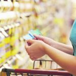The sophisticated couponing industry in the United States that helps consumers lower their food bills doesn’t exist in Canada. Without it, says the author, Canadian consumers are held hostage by food inflation. | Getty Images