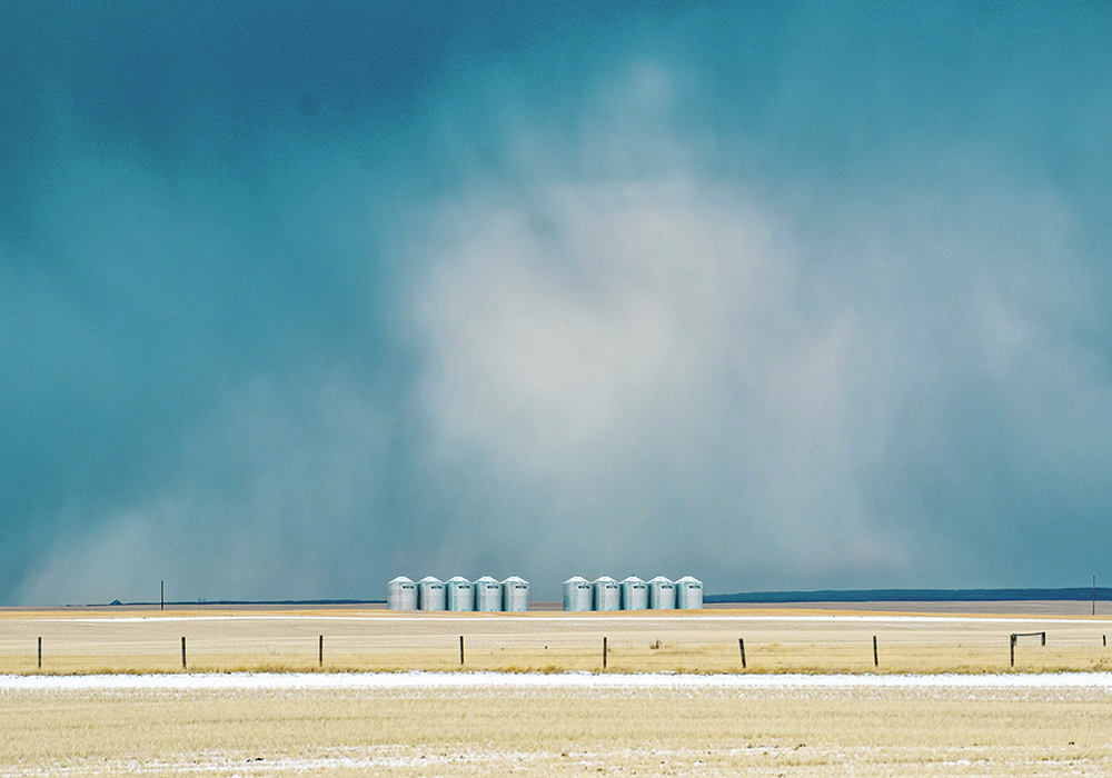 Only a tiny amount of moisture in the form of snow pellets and rain actually hit the ground April 10 near Blackie, Alta., despite the ominous clouds. Moisture levels are good in the northern Prairies, but the south remains dry. |  Mike Sturk photo.