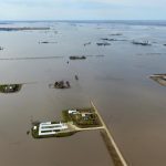 Flooding is causing problems for Manitoba hog, cattle and chicken farmers, who face washed-out roads, submerged highways and overland flooding. | Twitter/@harleysiemens photo