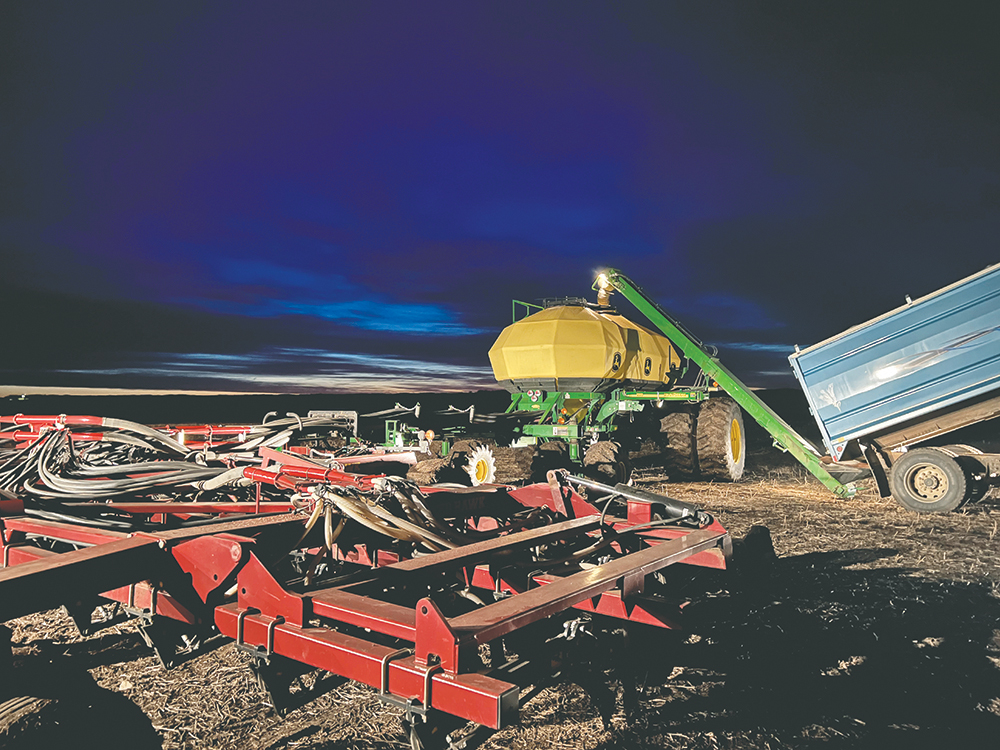 Seeding was underway near Corning, Sask., at 3:53 a.m. on May 10. Farmers will be working when they can to get the crop in the ground this season.  |  Braedyn Wozniak photo