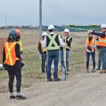 Members from UFA Co-operative’s senior leadership team gather with Marcel Roy, Mayor of Weyburn and Norm McFadden, Reeve for RM Weyburn, at the site of the future UFA Petroleum Agency in Weyburn. | Braedyn Wozniak photo