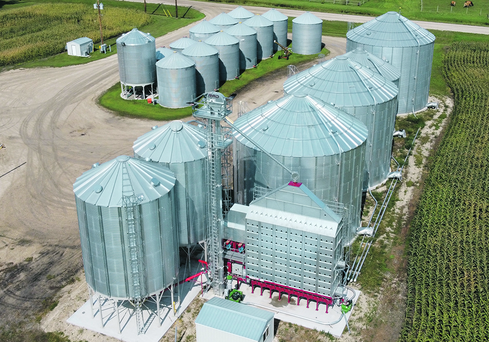 With cereals more than $10 a bushel and canola more than $20 a bushel, bankers are beginning to see the value in extra bin capacity, even though there’s often a lot of air space in the tops of those bins. They may never be full up, but extra space gives the grower the opportunity to turn grain and blend grain.  |  Wall Grain photos