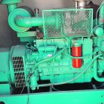 Bringing three-phase into the bin yard can cost $1 million. However, for $35,000 a farmer can buy a used three-phase 150KW genset from the Alberta oil patch. | Wall Grain photo