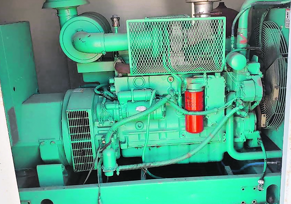 Bringing three-phase into the bin yard can cost $1 million. However, for $35,000 a farmer can buy a used three-phase 150KW genset from the Alberta oil patch. | Wall Grain photo