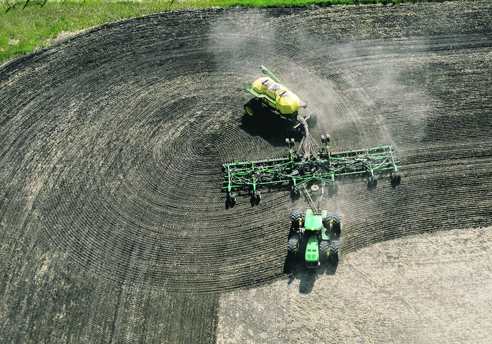 Cody Longson seeds barley in a field west of Cayley. | Mike Sturk photo
