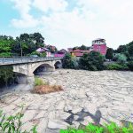 The Sangone River, a tributary of the Po, recently ran dry in an area of northern Italy near Turin. The Po is a major crop irrigation source and the region is now experiencing its worst drought in 70 years. | Reuters/Massimo Pinca photo