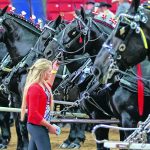 Jayna Locke of Cassopolis, Michigan, tends to Garry Fedore’s team in the senior driver over 65 class. | Sandy Black photo