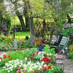 Don and Betty Engbrecht transformed their yard into a show piece using pieces of old farm machinery. | Don Engbrecht photo