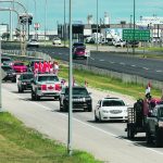 Protesters took to the roads, slowly, in Saskatoon July 23. About 75 cars and light trucks, without farm equipment, drove below posted limits in the city. The automotive march was said to be organized in support of Dutch farmers, but many of the protest signs pointed toward dissatisfaction with vaccine mandates, international travel restrictions due to COVID-19 and carbon taxes. A few signs called for support of farmers locally. | Mike Raine photo