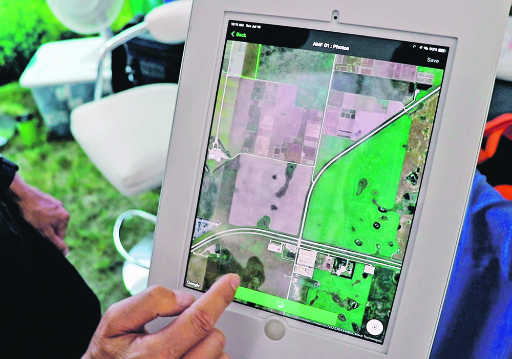 Kara Annand of Ag Grow Consulting says the AgScouter app that was designed to help agronomists efficiently take and send in field reports to customers.  |  Robin Booker photo