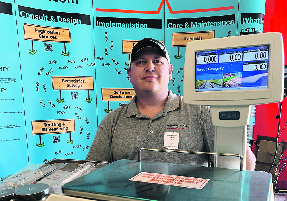 Chad Wallace of Precision Scale says farmers need to remember to keep their scales clean.  |  Ed White photo