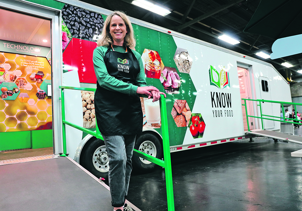 Luree Williamson, chief executive officer of Agriculture for Life, stands outside the new Know Your Food trailer, which will be taken across the province to help increase awareness of the Alberta food and agriculture industry. The trailer was open and on display at Edmonton’s K-Days.  |  Mary MacArthur photo