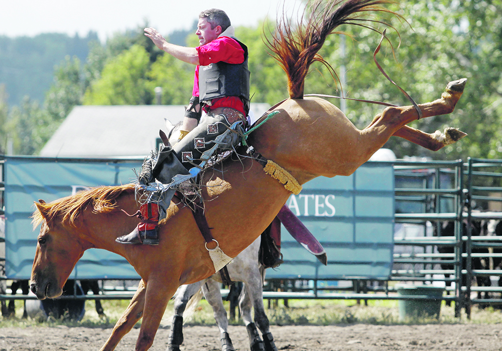 Jason Hanna rides a wild bareback horse. | Patrick Price photo