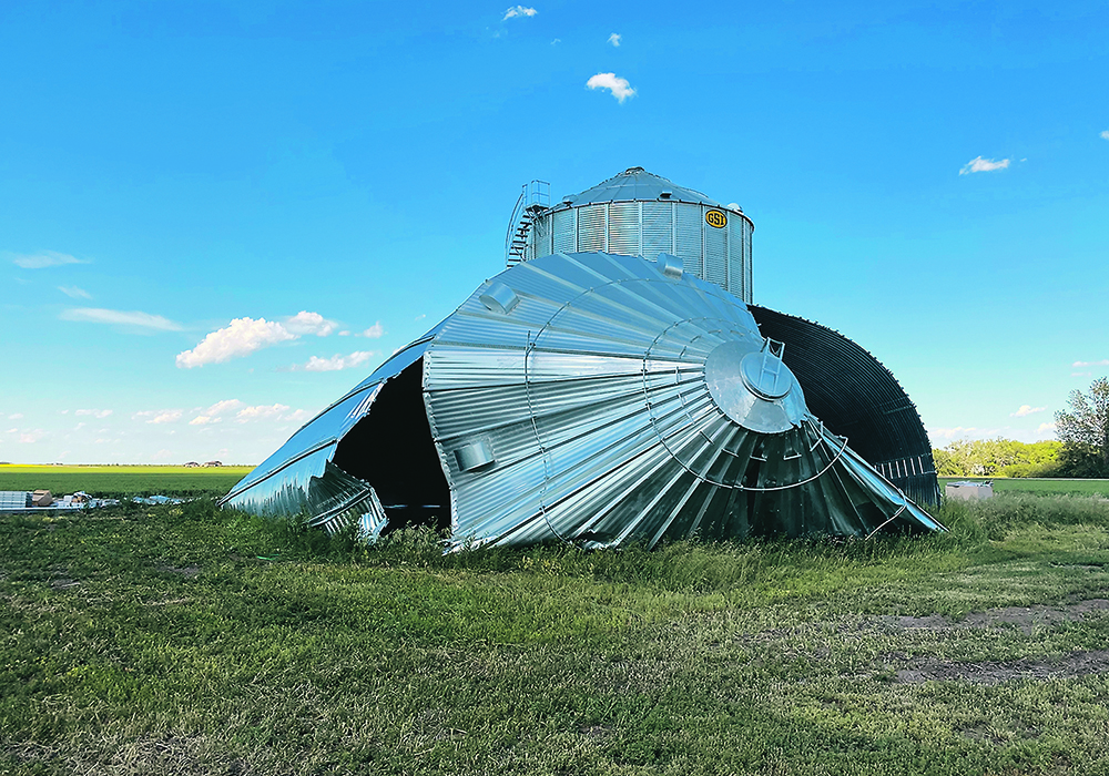 Bins in wind prone areas must have a wind ring — angle iron that completely attaches the roof to the rest of the structure, rather than just simple tabs. Without it, bins are especially vulnerable.  |  Submitted photo