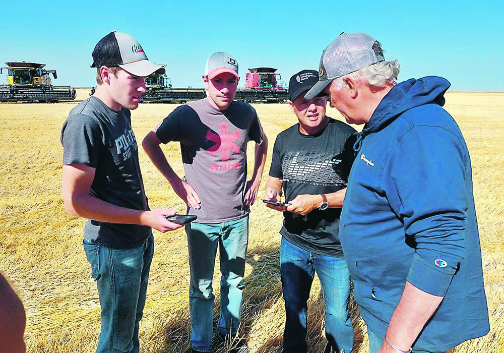 On Sept. 11, the Louise Grain Growing Project near Crystal City, Man., harvested 130 acres of wheat using six combines.  |  Canadian Foodgrains Bank photo