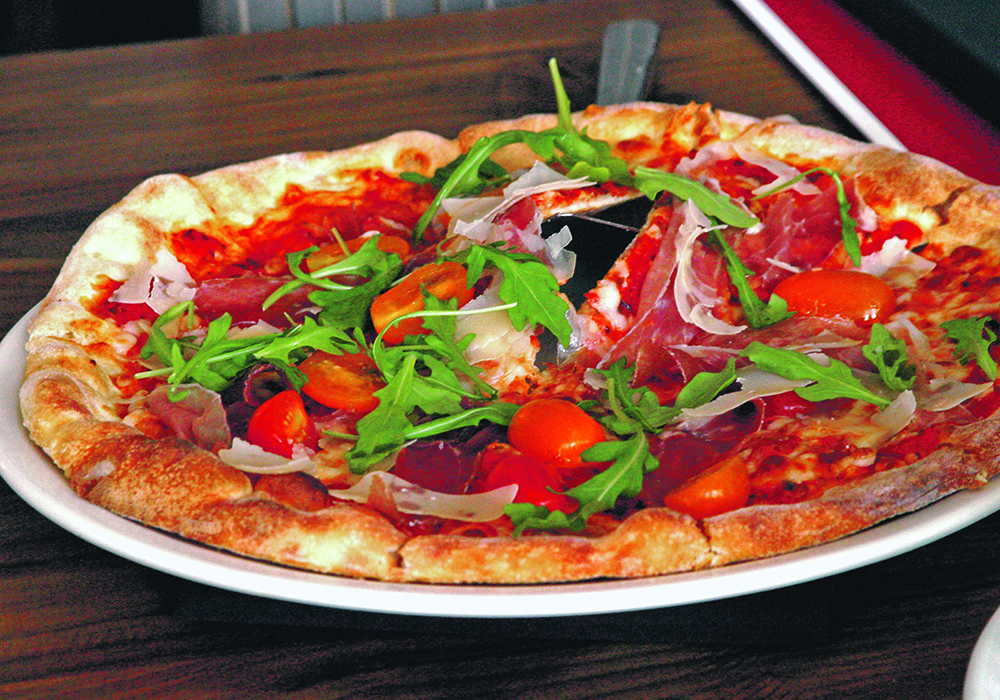 Dough can be made and frozen in individual portions. Simply pull one out of the freezer and let it defrost overnight in the refrigerator for fresh homemade pizza.  |  Sarah Galvin photo