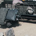 The TerraClear rubber belt system launches rocks with ease, tossing rocks as heavy as 400 pounds. Two high-speed drive belts below the rock and one belt on top handles rocks exceeding two feet in size. | Ron Lyseng photo
