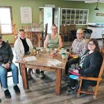 From left, Doug Scott, Mandy Melnyk, Carol and Stanley Garlon and Michelle Melnyk have coffee at the Gathering Place Co-op. It was established to sell their farm produce through a co-op model. Scott is a supporter of the co-op, but the others are all producer members. | Mary MacArthur photo