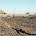 Contractors recently expanded an old dugout and filled it with tire derived aggregate on John Metz’s property at Corinne, Sask. The project is preparation for twinning Highway 6. | Karen Briere photo