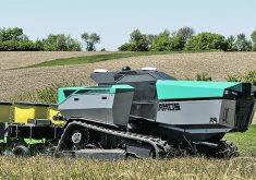 The Amos Power autonomous tractor uses an electric motor to power each track, and a third electric motor to power the power take-off. The battery on the tractors makes up the entire front end of the tractor. | Photo supplied by One3 Design