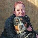 Gwen Mann, on one of her client farms with the family dog, offers advice on how to find a good farm sitter. | Tara Klager photo