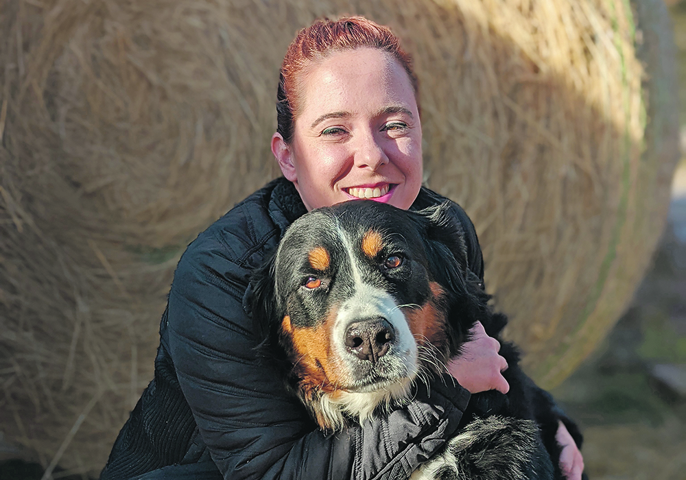 Gwen Mann, on one of her client farms with the family dog, offers advice on how to find a good farm sitter.  |  Tara Klager photo