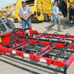 The Maxilator Accumagrapple bale accumulator lets the operator quickly organize ten bales into a square for easy pickup, according to Mark Brosh, sales rep for West River Equipment in Mandan, North Dakota. | Ron Lyseng photo