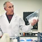 University of Lethbridge professor and researcher Dan Johnson holds a sample of the bio-pesticide he and his colleagues developed about 10 years ago that proved effective in grasshopper control. Despite several efforts, the treatment has never been commercialized. | Barb Glen photo