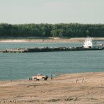 Barges make their way down the Mississippi River, where water levels have reached historically record lows. As of Nov. 3, corn shipments were 322 million bushels behind the pace needed to meet the U.S. Department of Agriculture’s export target, soybean exports were 76 million bu. off the pace and wheat exports were 18 million bu. behind. | Reuters/Karen Pulfer Foch photo